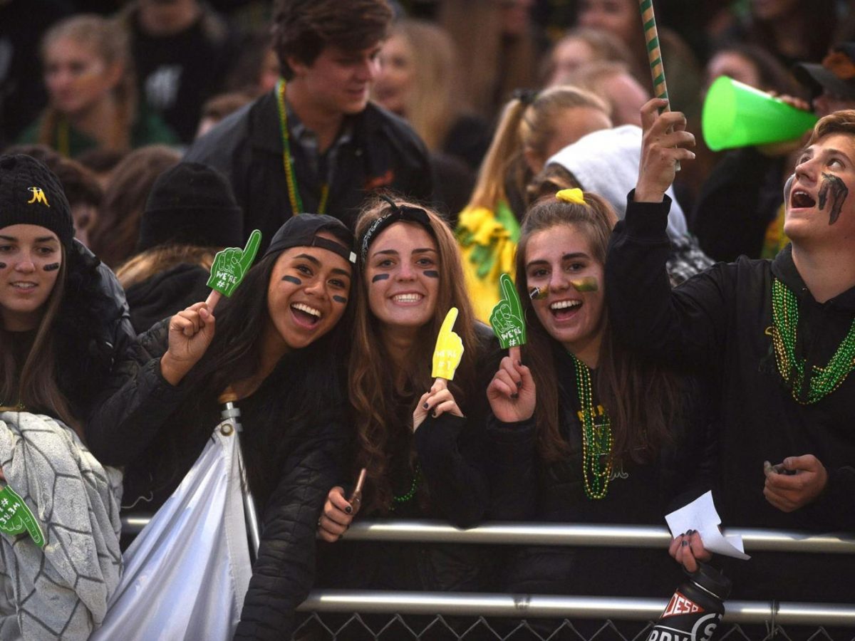 Manogue senior girls cheer on the football team during the September 22 game versus Reed.  Photo courtesy of the Reno-Gazette Journal.