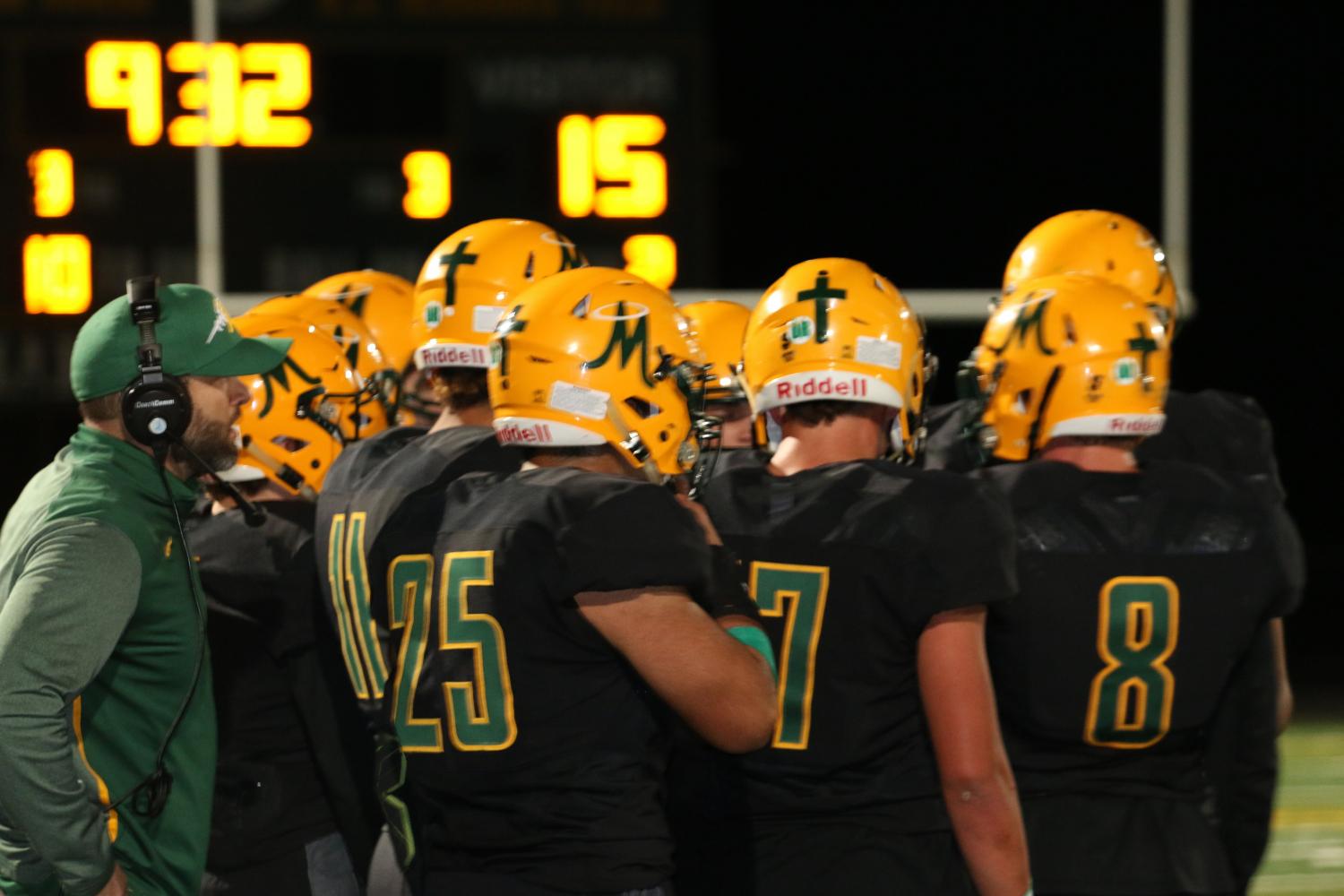 The Miner football team huddles during their September 22 game versus the Reed Raiders. (Photo courtesy of Jackie Cavilia and the Bishop Manogue yearbook staff)