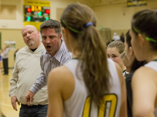 Craig Holt is shown coaching Manogue girls basketball in 2014.  Photo credits to Tom R. Smedes/Special to the RGJ and Reno Gazette-Journal.