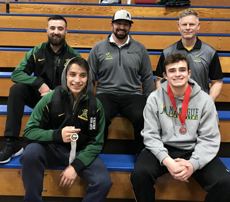 Anthony Rosas, Lincoln Hauck, and their coaches pose for a picture after the state tournament in Las Vegas on February 9.