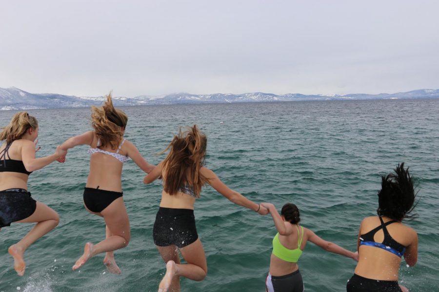 Kairos participants taking the leap into the cold Tahoe water. Photo courtesy of the Bishop Manogue Yearbook Staff.