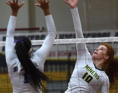Senior Emma Pence (middle blocker) goes up for a swing during last year's Reno match. (Photo courtesy of RGJ.)