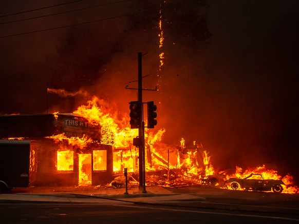 The deadly Camp Fire takes over a street in flames. Photo courtesy of Wired.