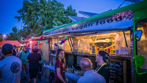 A warm summer night at Food Truck Friday in Idlewild Park along the Truckee River. Photo courtesy of Visit Reno Tahoe.