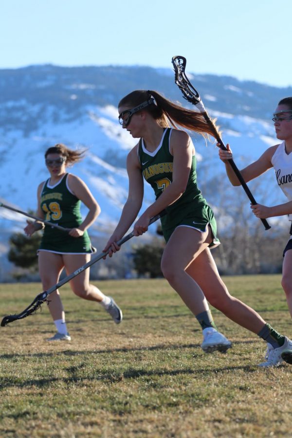 Mariclaire Geil runs down the field.  Photo courtesy of the Bishop Manogue yearbook staff.