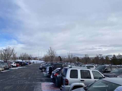 A filled student parking lot, with no parents visible