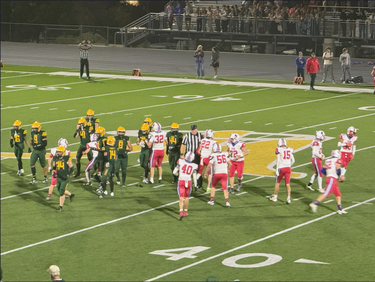 Manogue reigns victorious in Friday night football game