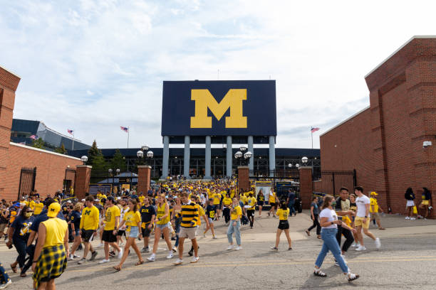 Ann Arbor, MI - September 4, 2021: Unidentified Fans exit Michigan Stadium after a University of Michigan football game